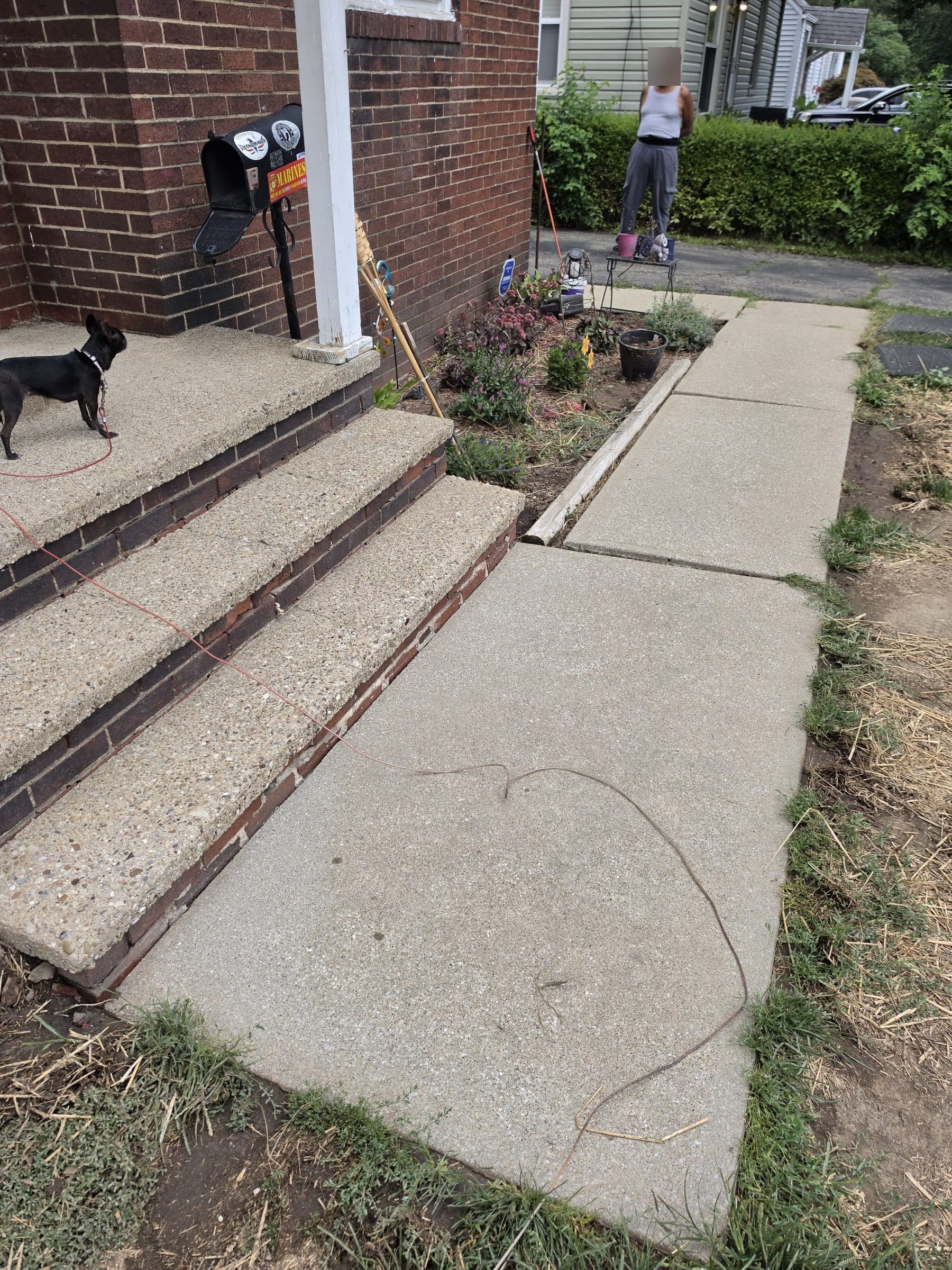 Residential porch and walkway in Canton, Ohio after concrete cleaning