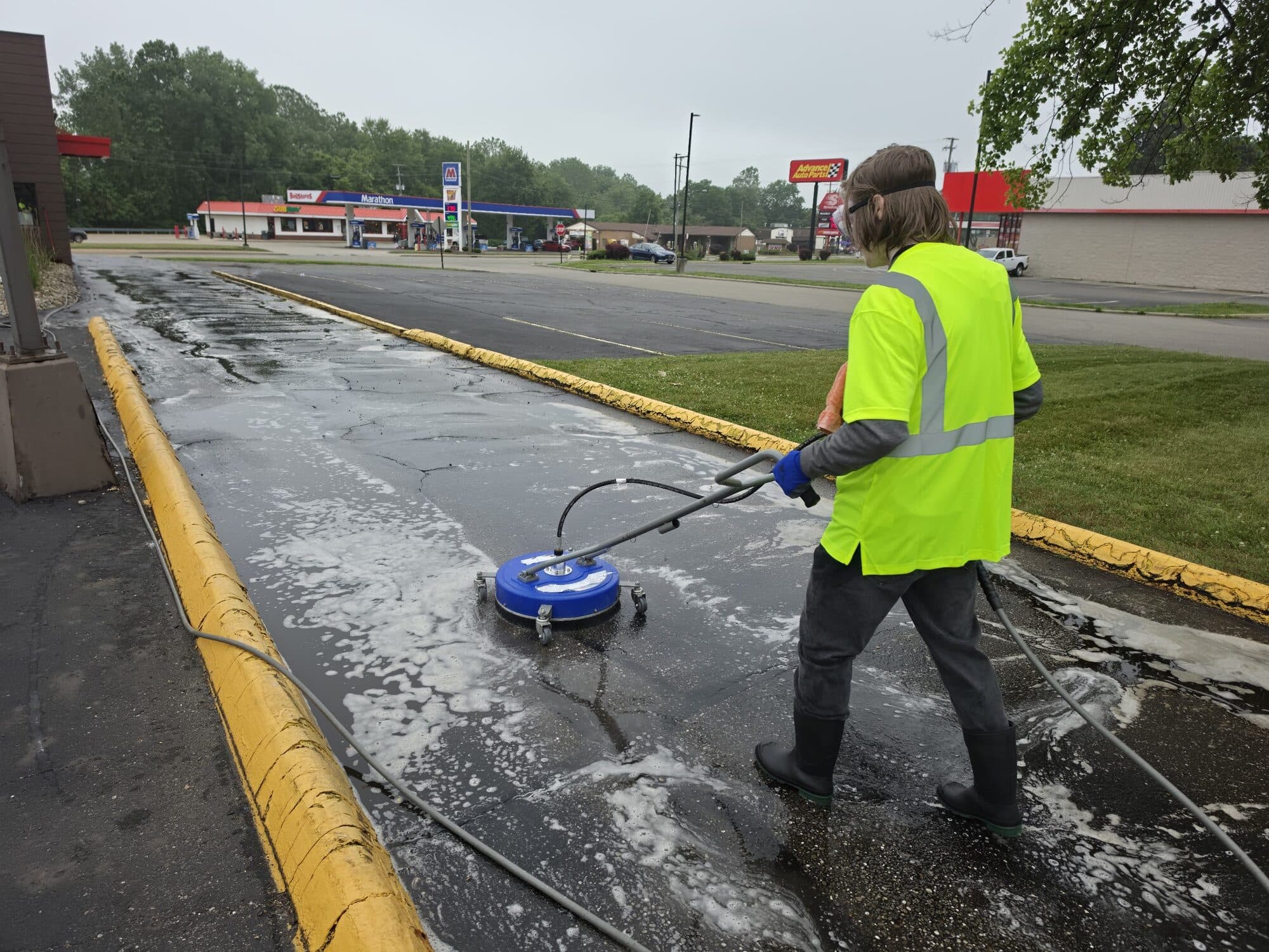 Commercial concrete in Massillon, Ohio during surface cleaning